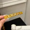 Nuevo Exquisito Brazalete de Flor de Lirio Dorado para Mujer, Gama Alta, Lujo Ligero, Nicho, Versátil y Elegante Joyería de Brazalete Incrustada con Diamantes