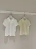 Wgwe9216 Guangzhou Shisanxing Moda Feminina Verão Novo Estilo Luxo Leve Gola Boneca Renda Manga Curta Camisa Top Fino