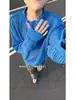 Suéter de punto hueco azul para hombre y mujer, nuevo estilo primavera y otoño, ajuste holgado casual, cuello redondo, suéter fino protector solar