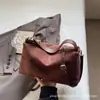 Bolsa Vintage Fosca de Nicho para Axila 2025 Inverno Nova Versátil Feminina Tendência Bolsa Transversal Única Alça Tote