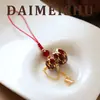 Encanto de Teléfono Original Retro Exquisito y Versátil de Calabaza Esmaltada Roja para Mujer con un Toque de Lujo de Gama Alta
