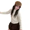 Camiseta básica de niña estilo coreano con estampado floral pequeño, nueva colección otoño/invierno 2026, para niños de talla mediana y grande, con cuello semi-alto y detalle de lazo, hecha de tela polar suave, capa interior de moda