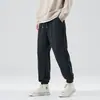 Pantalones de chándal de estilo americano para hombre, nuevo modelo primavera y otoño 2026, corte holgado, estilo jogger, deportivos, pantalones casuales grises de alta gama