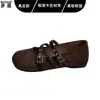 Sapatos Mary Jane estilo vintage com bico redondo, feitos de couro, apresentando tiras cruzadas, uma sola macia para uso confortável e uma abertura rasa.