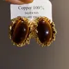 Brincos Olho de Tigre Estilo Melanoid Retro Senso de Design de Nicho Brincos Versáteis Luxo Leve Moda de Alta Qualidade Brincos de Tarraxa para Mulheres