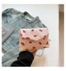 Bolso de Hombro Pequeño de Alto Valor con Lazo para Mujer 2025 Verano Nuevo Simple Estilo Occidental de Pana Estampada Bolso de Axila