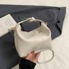 Bolso de Mano Tejido con Patrón de Axila Invierno 2025 Nuevo Bolso Tipo Dumpling de Moda para Desplazamiento Casual de Color Sólido Elegante