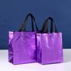 Bolsa de Mão para Loja de Roupas Aluminizada Não Tecido Bolsa a Laser Dobrável Embalagem Brinde Publicitário Promoção Sacola de Compras