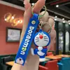 Llavero con forma de Doraemon, Doraemon de dibujos animados, llavero para coche, charm para bolso, accesorio para parejas, regalo, venta al por mayor