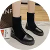 Botines negros de cremallera para mujer con punta redonda