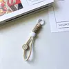 Accesorios de Cuerda Tejida con Cara Sonriente de Dopamina Colgante Estilo Dulce y Fresco Encanto para Bolso de Alto Valor Llavero Modelo Nuevo para Mujeres