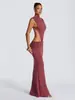 Ropa de Mujer al por Mayor Europea y Americana 2026 Cuello Alto sin Mangas Ajustado de Alta Gama Hueco Revelador de Cintura Sexy Espalda Descubierta Vestido Largo