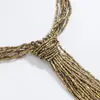 ZA nuevo collar vintage de cuentas de arroz marrones multicapa con borla larga cadena para el cuello cadena para la clavícula europea y americana transfronteriza para mujer