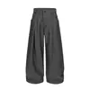 Pantalones casuales plisados de estilo americano para calle, fluidos, con diseños de moda, bolsillos únicos, color liso y corte holgado de pierna ancha para hombre.