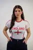 Camiseta de Verano 2025 para Mujer con Estampado de Letras de Bandera Nacional, Cuello Redondo, Estilo Callejero de Moda, Corte Ajustado, Secado Rápido, Prenda Transfronteriza