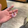 Chaveiro de acrílico transparente com areia movediça de desenho animado, pingente de bolsa, pequeno presente para crianças, decoração de carro
