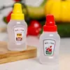 Botella de salsa especial de fábrica directa transfronteriza, botella pequeña linda para apretar, botella de condimento, botella secundaria de salsa de tomate para ensalada, lote