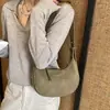Design transfronteiriço, bolsa de mão nicho em forma de meia-lua, nova e moderna bolsa de bolinho trançada retrô, bolsa de ombro, bolsa crossbody