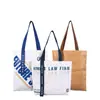 Sacolas de papel Dupont com logo personalizado, sacolas de compras promocionais de papel kraft estilo vintage, mochilas laváveis de papel Dupont para atacado