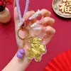 El Dios de la Riqueza Llega en el Año del Caballo, Llavero Dorado, Riqueza Instantánea, Colgante para Bolso, Colgante de Caballo Pequeño, Pequeños Regalos de Año Nuevo al por Mayor