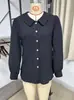 Camisa de lino para mujer, diseño cruzado europeo y americano 2026, nicho, para el trabajo, manga larga, holgada, cuello en V, para todas las estaciones