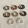 Aretes Redondos Envueltos en Cuero de Aguja Plateada, Aros Artísticos Retro Simples, Pendientes de Lujo Ligero de Moda de Alta Gama al por Mayor para Mujer