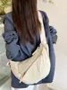 Bolso cruzado para mujer, simple y versátil, casual y para el trabajo, diseño ligero, bolso de hombro de nicho, bolso tipo dumpling
