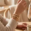 Set de pulseras metálicas brillantes retro europeas y americanas para mujer, brazalete ancho de espiral exagerado personalizado