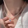 Collar con colgante de gota de agua de perla Swarovski aguamarina de doble capa para mujer, colgante de circonita elegante y moderno, gargantilla de lujo ligero