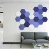 Venta al por mayor del fabricante Pegatinas de pared de fieltro hexagonal de fondo Autoadhesivas Decorativas de fieltro para pared Coloridas A prueba de sonido Tablero hexagonal de fieltro