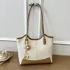 Bolsa feminina transfronteiriça retrô de grande capacidade, nova moda outono 2026, bolsa de mão, bolsa de ombro, bolsa tote simples para o dia a dia