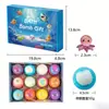 En stock transfronterizo 12*50g bolas de sal de baño de juguete para niños, bolas de baño con juguete marino en el interior, set de caja de regalo de bolas de sal de baño