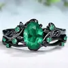 Anillo de pareja cruzado Sanjie de comercio transfronterizo europeo y americano retro de moda, anillo de rubí, ramas de rosa negra, par cruzado