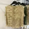 2026 Verano Nueva Ropa para Mujer Bordada Ganchillo Hueca Sin Mangas Camisa para Mujer Chaleco Superior con Botón Lateral Trasero
