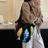 Bolsa tejida de gran capacidad para mujer, nuevo diseño de moda 2026, estilo nicho, bolso de hombro versátil, casual y ligero, perfecto para llevar bajo el brazo