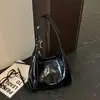 Bolso de mano para mujer 2026 nuevo simple color liso nicho retro versátil diario para ir al trabajo tote bandolera