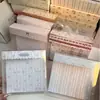 En Stock Gomas Grandes para el Cabello Caja Transparente Accesorios para el Cabello Caja de Regalo Pinzas para el Cabello Lindas con Tarjeta Trasera Impresión de Logo