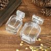 Venta al por mayor en stock frasco de vidrio para perfume 30ml 50ml spray bayoneta subenvasado portátil botella vacía polígono transparente 100