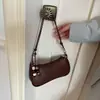 Bolso de mano pequeño casual minimalista transfronterizo para mujer, nuevo bolso cruzado elegante 2026, adecuado para el trabajo y los desplazamientos, bolso de hombro y bolso de axila