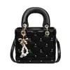 Bolso de Mano Cuadrado Pequeño de Diseño de Nicho Estilo Coreano para Mujer Nuevo Modelo Primavera 2026 Bolso de Hombro Cruzado Elegante de Alta Calidad