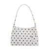 Bolso de axila de nicho estilo francés para mujer, bolso de mano nuevo con estampado de lunares, bolso de hombro de moda coreana estilo 2026 ins