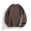 Moletom masculino preto elegante e simples com gola redonda e design patchwork, pulôver casual solto sem capuz para primavera/outono de 2026