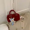Bolsa de Ombro e Mão Nova Estilo Primavera 2026 de Aparência Sofisticada Dopamina para Trabalho e Deslocamento Feminina Estilo Coreano Bolsa Transversal Simples