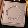 [Collar + Pulsera] Estilo Francés Ins de Lujo Accesible Cadena para Clavícula de Corazón Estilo Dulce Collar de Acero de Titanio con Borla de Corazón de Melocotón para Mujer