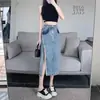 Falda larga vaquera de nuevo estilo 2026 con abertura para mujer, falda larga irregular de línea A para verano con efecto de caída, diseño único