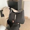 Bolsa de Ombro de Alta Qualidade com Senso de Moda de Nicho para Axila Feminina Nova Primavera e Verão 2025 Bolsa Tote Casual Portátil para o Dia a Dia