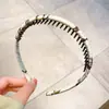 Venta al por mayor de fábrica paquete de cabello diadema para el cabello diadema nueva para mujer para lavarse la cara con dientes antideslizante para cabello corto rebelde pinza para el cabello cueva para el cabello