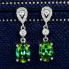 Brincos de cristal de esmeralda retrô europeus e americanos transfronteiriços Brincos de zircão incrustados de diamantes de baixo luxo Elegantes brincos de esmeralda de quatro garras