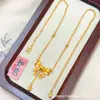 Tienda de Oro Mismo Estilo Collar Dorado Arena con Lazo para Mujer, Versátil y Elegante, Cadena para Clavícula, Joyería de Moda y Exquisita Transmisión en Vivo