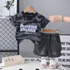 Traje de Manga Corta de Moda para Niños de Comercio Exterior 2026 Nueva Ropa de Verano Traje Casual de Pantalones Cortos de Manga Corta para Niños Pequeños y Medianos